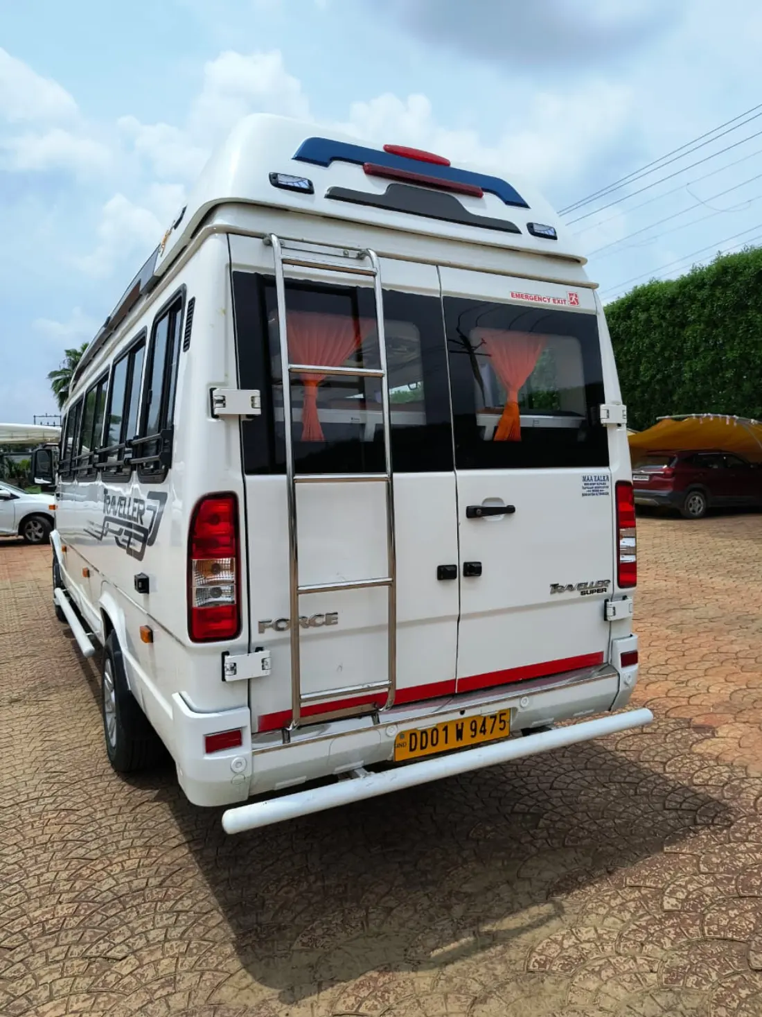 Rear view of a white Force Traveller