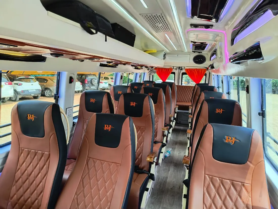 Spacious push-back seating inside the Tempo Traveller